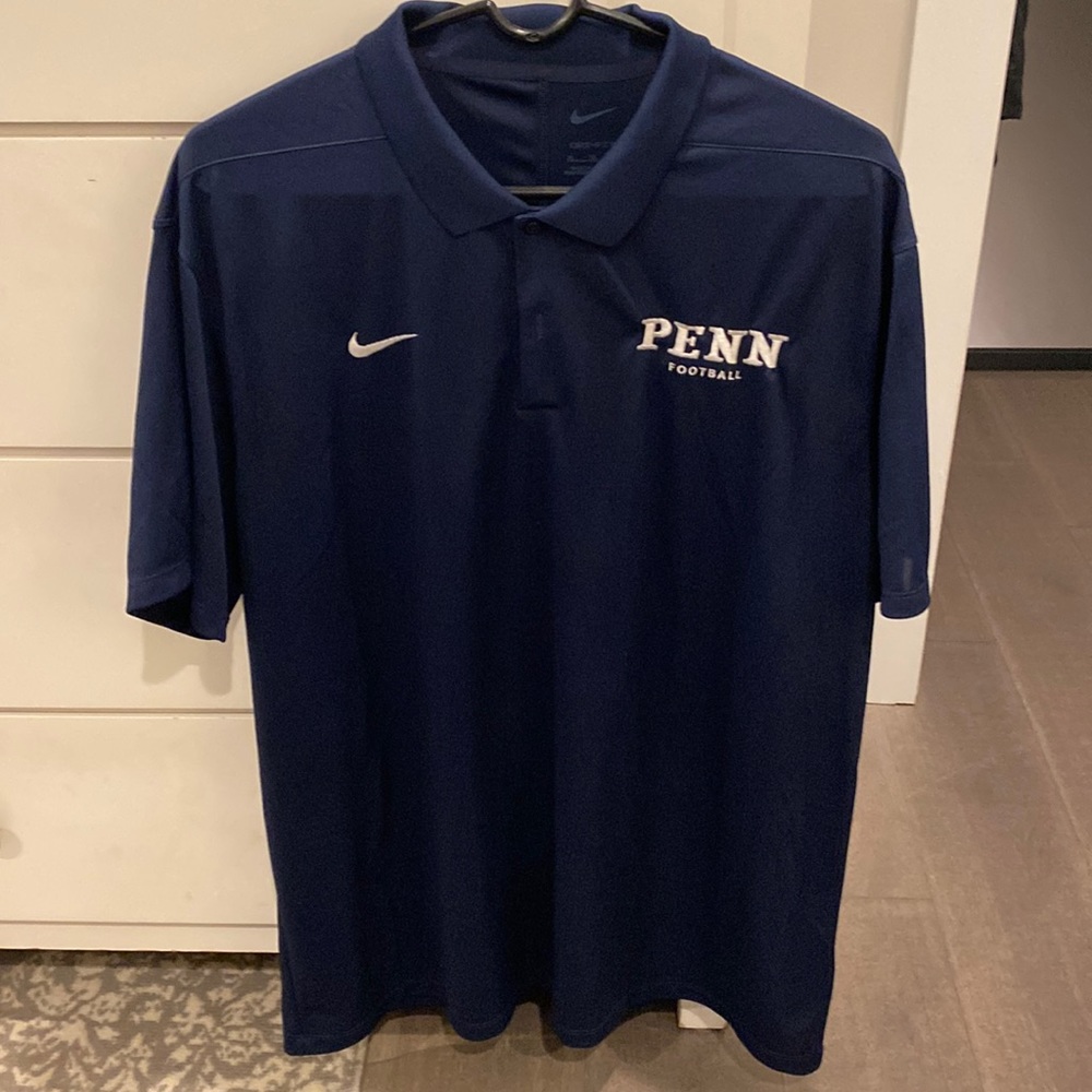 XL Nike Dri Fit Navy Polo. Penn Football. Great condition.